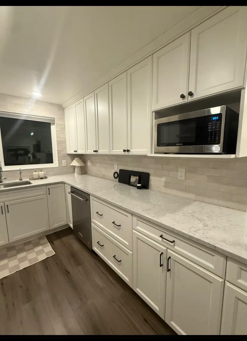 Kitchen counters with stone backsplash